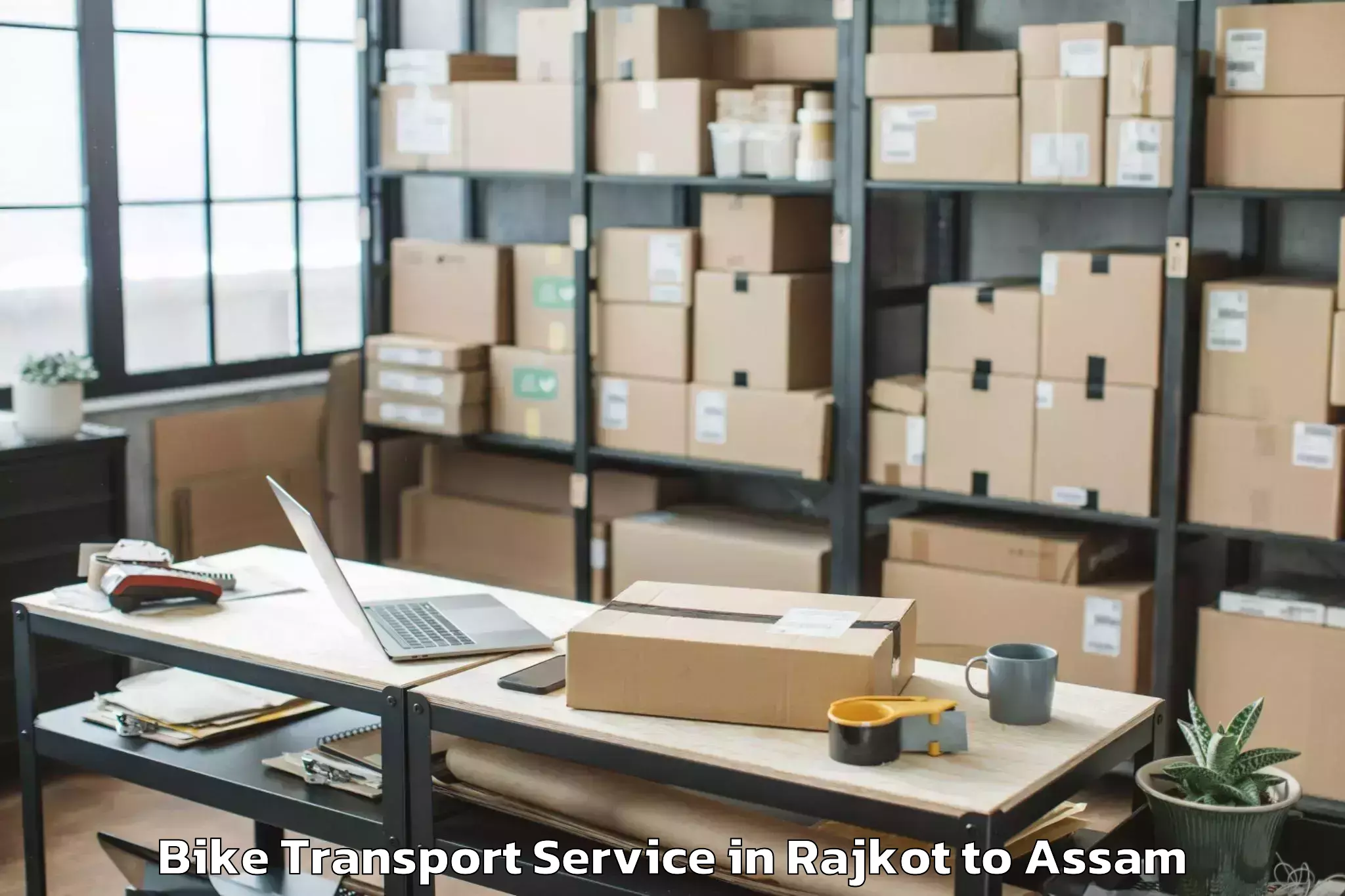 Leading Rajkot to Bajali Bike Transport Provider